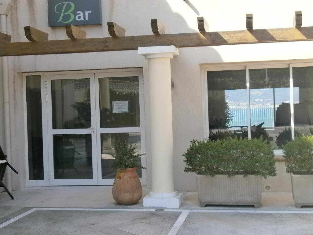 Hotel Au Tapis De Sable Saint-Cyr-sur-Mer Esterno foto
